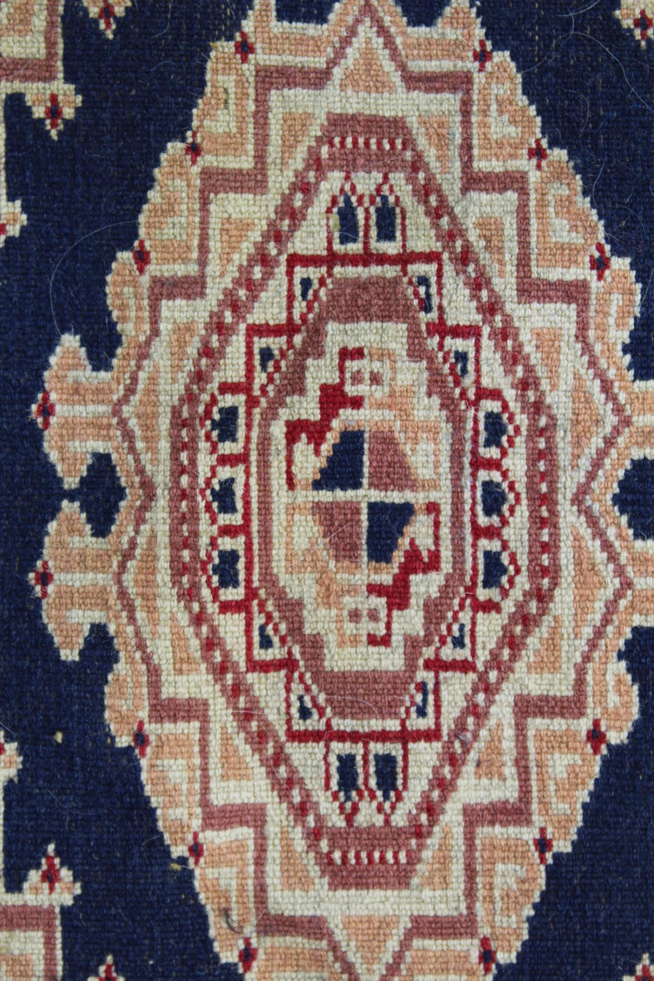 Eastern wool rug with multiple hooked octagonal medallions on blue field, 201cm x 124cm. - Image 12 of 12