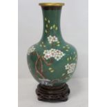 20th century Chinese cloissoné vase of baluster form, decorated with flowering prunus and magnolia