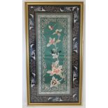 20th century Chinese silk embroidered panel of a bird, butterfly and flowers surrounded by