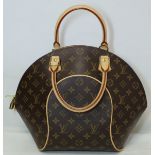 Louis Vuitton monogram Eclipse bowling bag in coated fabric with cow hide leather trim and fabric