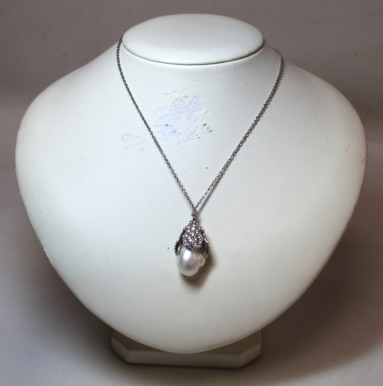 Balenciaga Mother of Pearl and white crystal necklace in the form of a flower bud. Boxed with