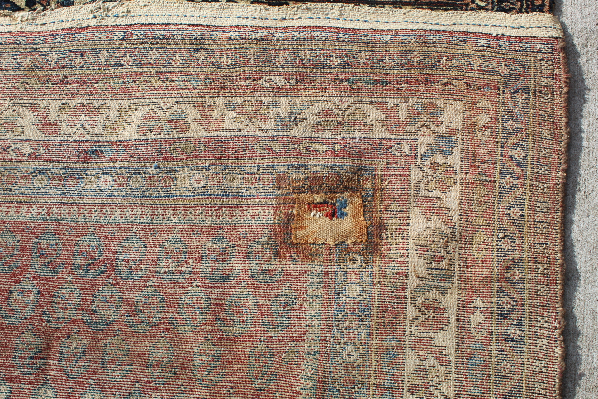 Persian wool rug in red, blue and cream with multiple boteh to main field , 199cm x 130cm. Old - Image 7 of 9