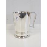Silver pint mug, tapering, with reeded band and handle, Sheffield 1942. "To Captain R.J.