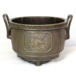Chinese Qing dynasty patinated bronze censer or jardinere of twin handled lobed circular form with