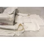 Box of table linen and bed linen including embroidered, cut work and damask tablecloths, sheets,
