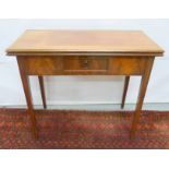 19th century mahogany fold over rectangular tea table raised on square tapered supports 86cm