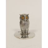 Silver owl menu holder with glass eyes on circular base, by S. Mordan & Co. Chester 1906.