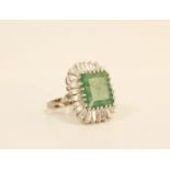 Impressive diamond and emerald cluster ring, the emerald given as approx. 3.5ct surrounded by