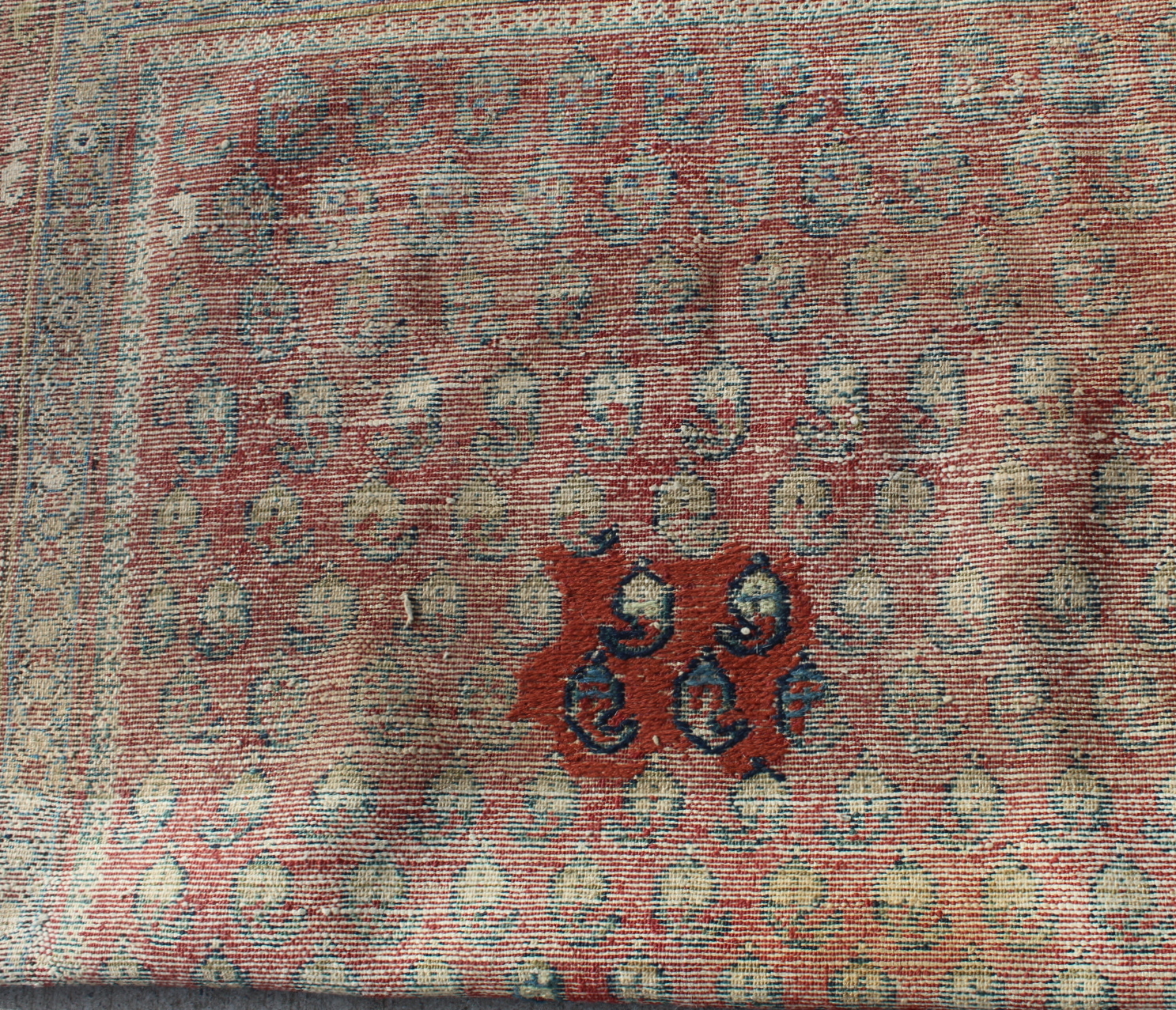 Persian wool rug in red, blue and cream with multiple boteh to main field , 199cm x 130cm. Old - Image 8 of 9