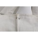18th century large linen bedsheet with central seam, cross stitched embroidered initials C.W. and