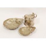 Two silver butter shells, a plain drum mustard pot, 1937 with Newcastle spoon 1800, 218g.