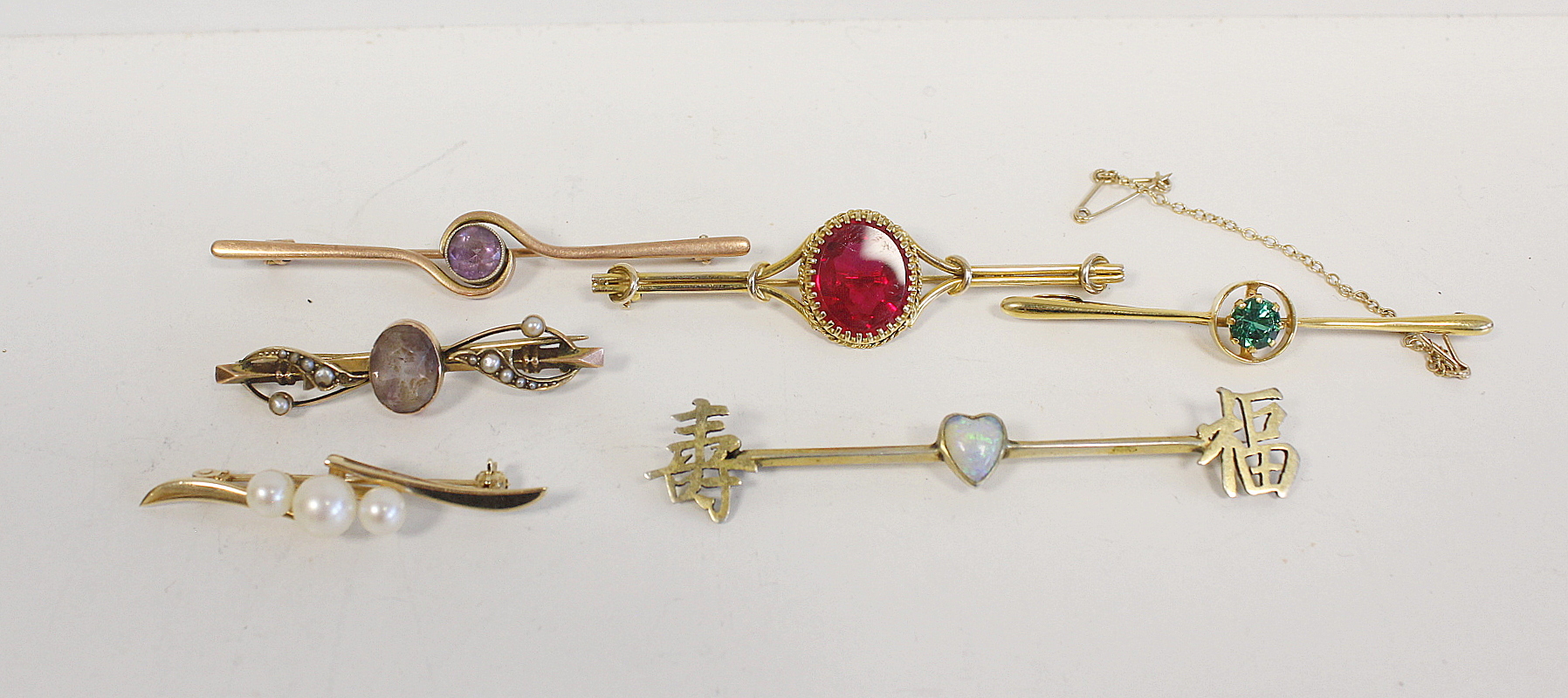 Chinese silver bar brooch with opal heart and another five, various '9ct' gold, (6g).