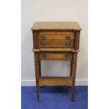 Oak canteen of cutlery, two drawers on stand containing part suite of Old English pattern cutlery