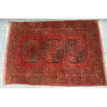 Small Persian red and black prayer mat with three octagon medallion, 125cm x 86cm.