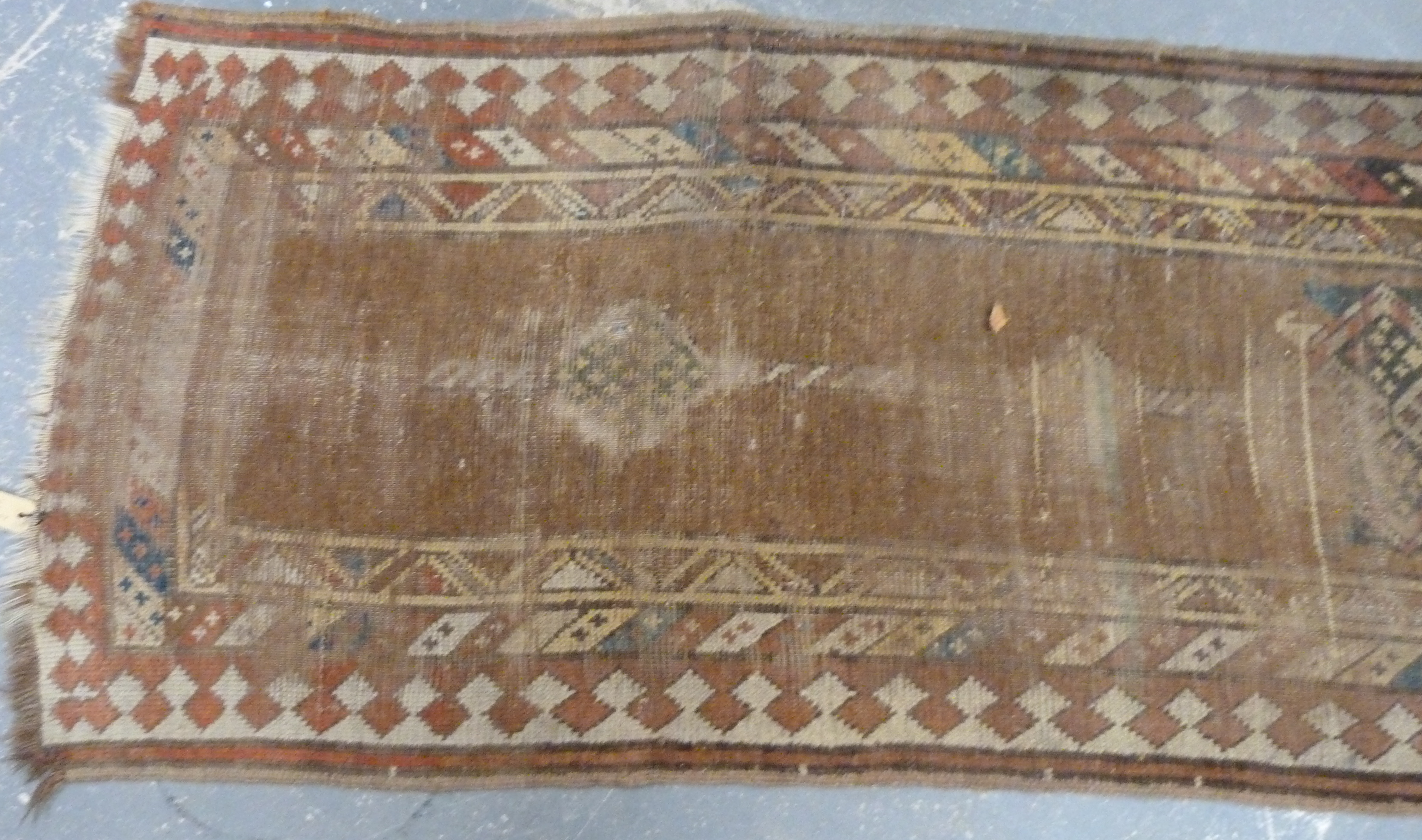 Turkish wool runner with geometric medallions and borders in muted palette, 285cm x 83cm, well worn. - Image 2 of 4