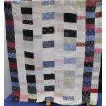 Small early 20th century pieced block patchwork reversible quilted bedspread in various printed