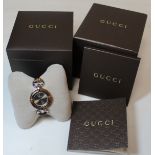 Gucci lady's bamboo and stainless steel wristwatch with bronzed circular dial and snaffle bit