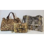 Michael Kors lady's handbag in python embossed leather with gilt metalware, with matching zip around