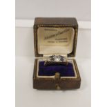 Edwardian ring with diamond brilliant, approx. .6ct, flanked by four sapphires and two smaller