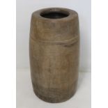 Antique treen stick stand of tapered cylindrical form, turned from a single piece of wood, 45cm