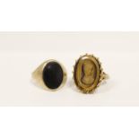 9ct gold signet ring with intaglio 'tigers eye' portrait and another with onyx. (2).