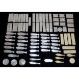 Collection of 19th century Chinese mother of pearl gaming counters, comprising: thirteen shaped as