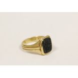 18ct gold signet ring, monogrammed on bloodstone, 6.8g gross. Size 'K'.