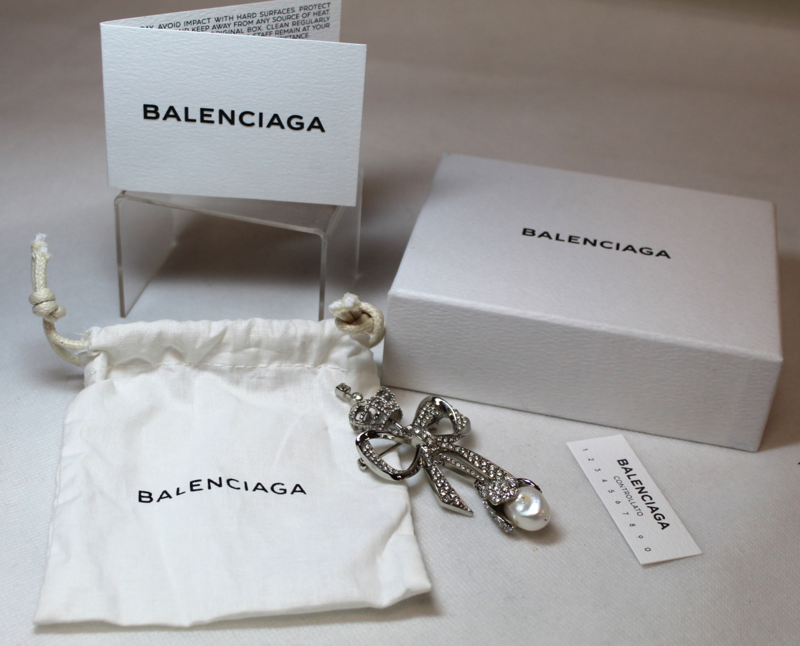 Balenciaga bow and crown white crystal and Mother of Pearl brooch, 9cm long. Boxed with jewellery - Image 4 of 4