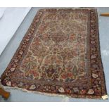 Persian wool on cotton floral carpet in polychrome on cream field, 204cm x 146cm.