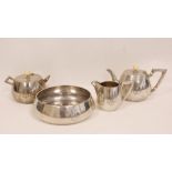Russian silver tea pot of plain almost Art Deco style, tapering, with milk jug, sugar bowl and basin