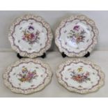 Set of four Dresden porcelain plates with polychrome floral decoration and gilt foliate scrolls to