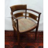 Edwardian inlaid mahogany tub chair raised on tapering supports