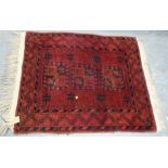 Small Persian red and black prayer mat with three octagon medallion, 90cm x 70cm.