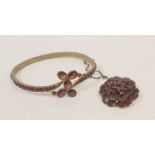 Victorian pyrope garnet hinged bangle in 'garnet' gold and a similar cluster brooch. (2).