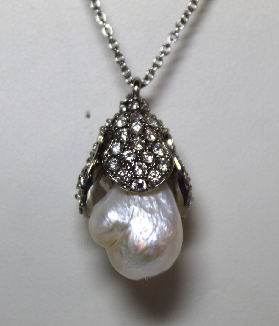 Balenciaga Mother of Pearl and white crystal necklace in the form of a flower bud. Boxed with - Image 4 of 6