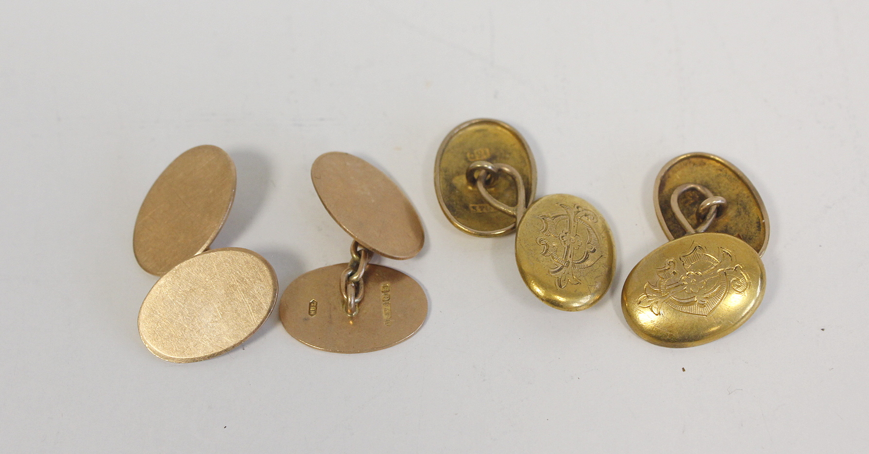 Pair of Victorian gold domed oval cufflinks, monogrammed J.G. by Grinsell & Sons, '15c' and