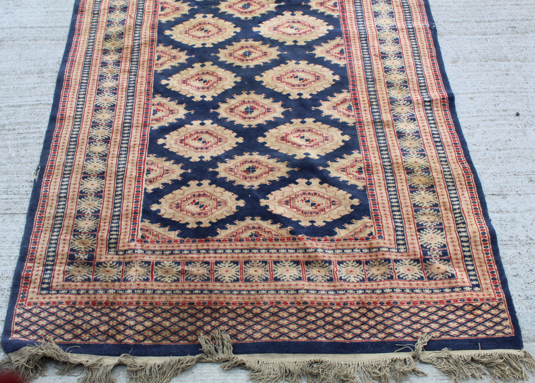 Eastern wool rug with multiple hooked octagonal medallions on blue field, 201cm x 124cm. - Image 2 of 12