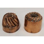 Two Benham & Froud copper jelly or cake moulds, one of spiral fluted domed form no. 436, 10.5cm