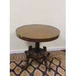 Reproduction circular centre table raised on turned column and platform base