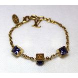 Louis Vuitton "Gamble Crystal" bracelet with three Swarovski crystal set cubes and LV charm,