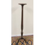 19th century mahogany carved and reeded torchere.