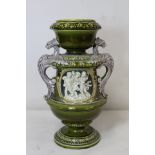 Large Continental Majolica, probably German, vase of baluster form with twin griffin handles and