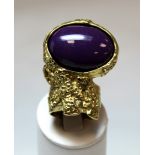 Yves Saint Laurent "Arty" cocktail ring in gilt metal with purple oval cabochon, size P, with