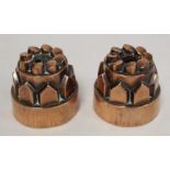 Pair of antique French small copper ring jelly or cake moulds of domed castellated form, one stamped