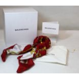 Balenciaga silk twill wrapped metal cuff or bracelet, the red and white scarf with gilt chain