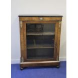 Victorian inlaid walnut side cabinet with metal mounts enclosed by single glazed door, on bun feet