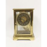 French mantel clock of four glass type with silvered dial, 19cm.