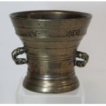 17th century Dutch bronze mortar of flared twin dolphin handled form with foliate scroll banding and