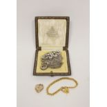 Gold child's bracelet '9ct', a similar locket (5g gross), a silver napkin clip, 1909, a clip, a