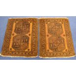 Pair of small Persian prayer mats with two geometric medallions, each approx. 80cm x 65cm. (2).